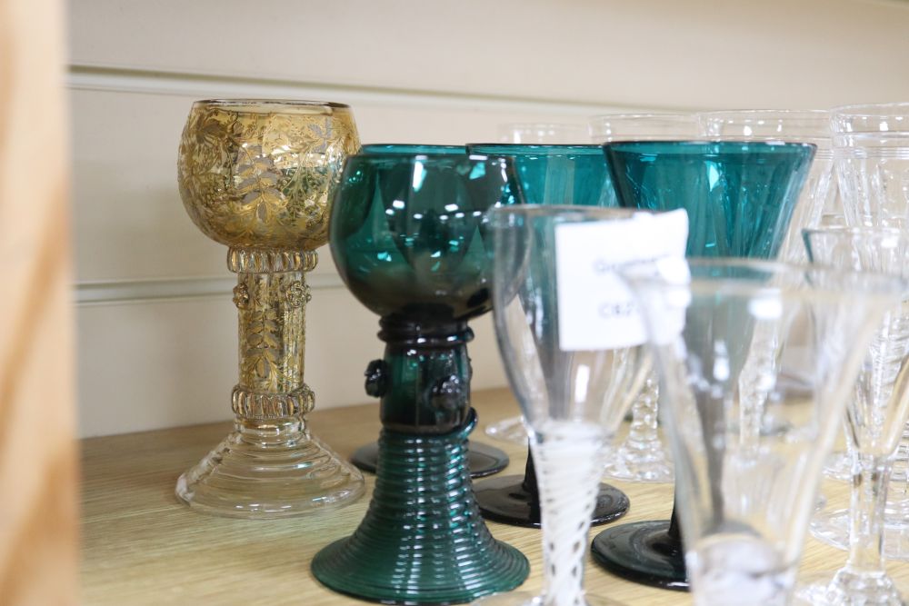 A collection of green glass and cut glass